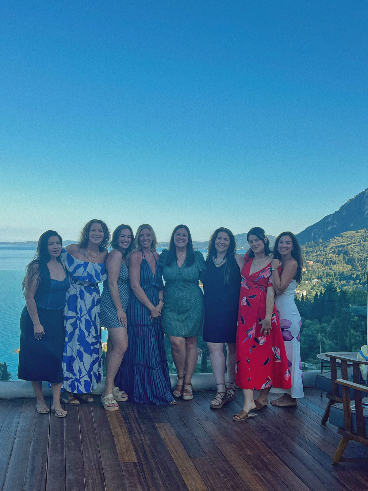 Group of friends together on a terrace in Corfu
