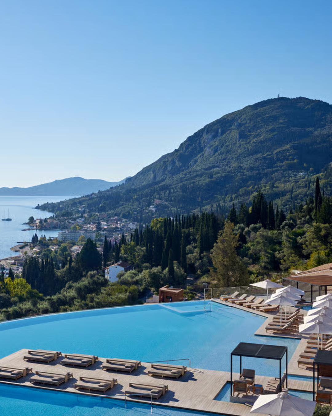 Infinity pool overlooking the Ionian sea and mountains
